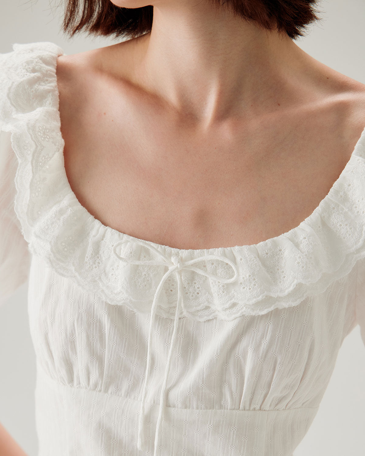 White Textured Scoop Neck Ruffle Blouse